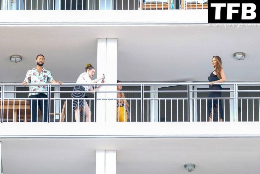 Chrissy Teigen & John Legend Kiss and Pose During an Impromptu Balcony Shoot - #21