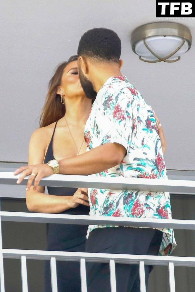 Chrissy Teigen & John Legend Kiss and Pose During an Impromptu Balcony Shoot - #20