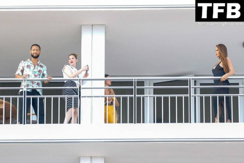 Chrissy Teigen & John Legend Kiss and Pose During an Impromptu Balcony Shoot - #23