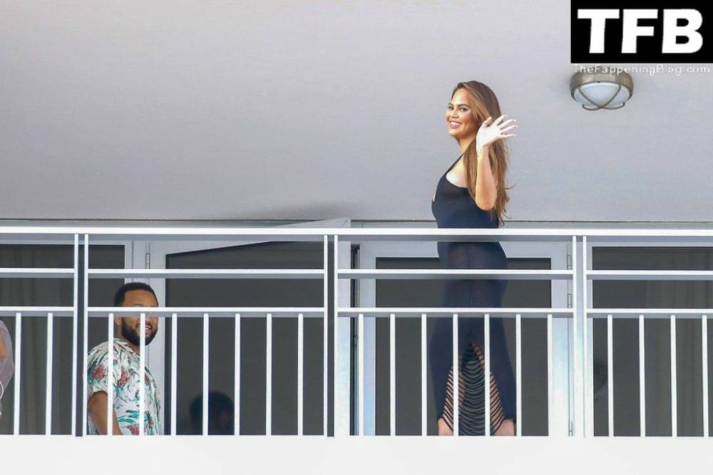 Chrissy Teigen & John Legend Kiss and Pose During an Impromptu Balcony Shoot - #30