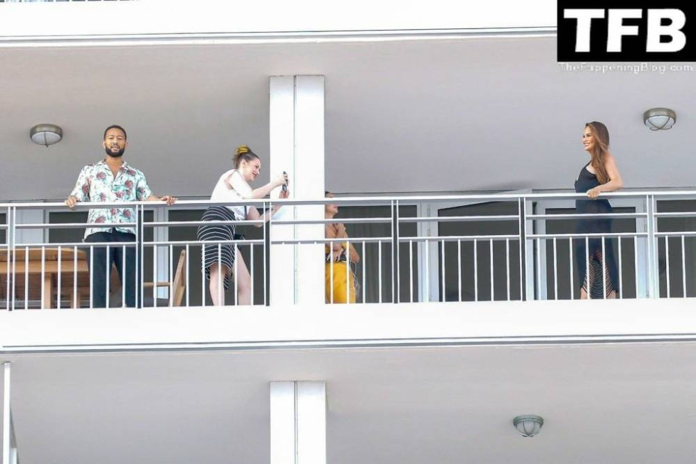 Chrissy Teigen & John Legend Kiss and Pose During an Impromptu Balcony Shoot - #22