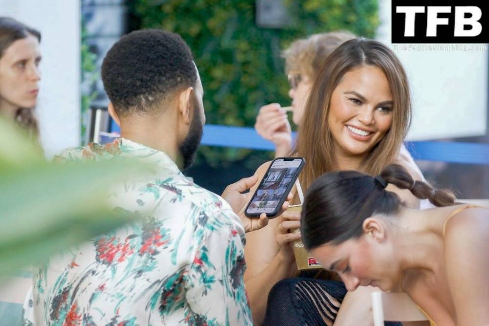 Chrissy Teigen Goes Braless Under a Very Sexy Sheer Black Dress in France - #4