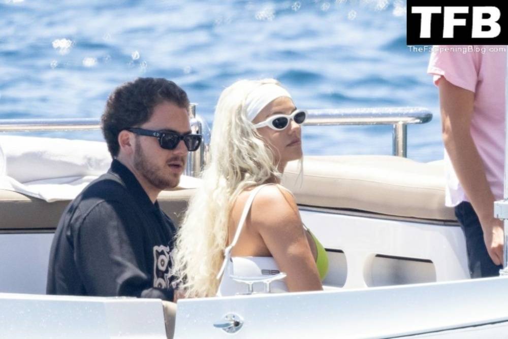 Kelsey Calemine Rocks a Yellow Bikini Aboard a Yacht on a Summer Break in Nerano - #26