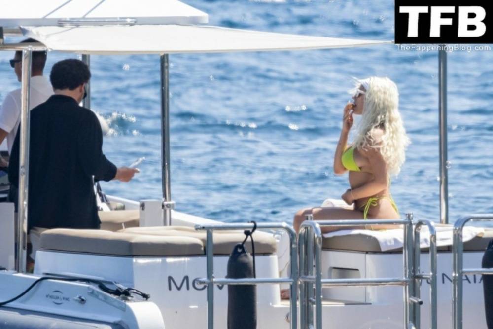 Kelsey Calemine Rocks a Yellow Bikini Aboard a Yacht on a Summer Break in Nerano - #21