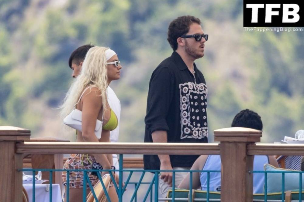 Kelsey Calemine Rocks a Yellow Bikini Aboard a Yacht on a Summer Break in Nerano - #25