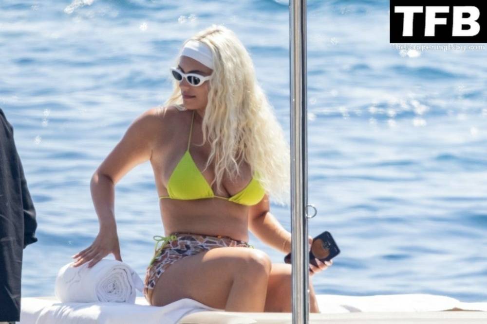 Kelsey Calemine Rocks a Yellow Bikini Aboard a Yacht on a Summer Break in Nerano - #27
