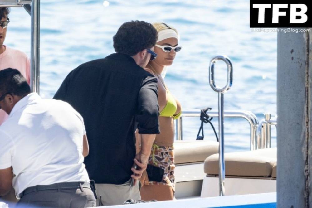 Kelsey Calemine Rocks a Yellow Bikini Aboard a Yacht on a Summer Break in Nerano - #24