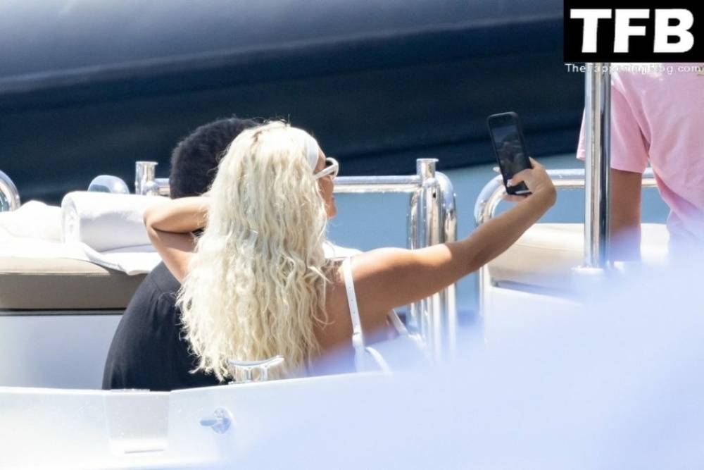 Kelsey Calemine Rocks a Yellow Bikini Aboard a Yacht on a Summer Break in Nerano - #30