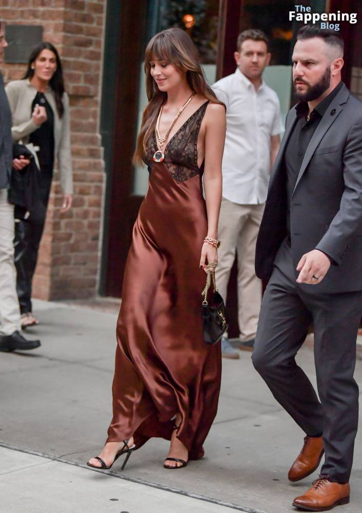 Dakota Johnson Stuns in a Copper Silk Gown Leaving Her Hotel in NYC (29 Photos) - #20