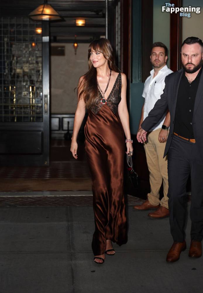 Dakota Johnson Stuns in a Copper Silk Gown Leaving Her Hotel in NYC (29 Photos) - #29