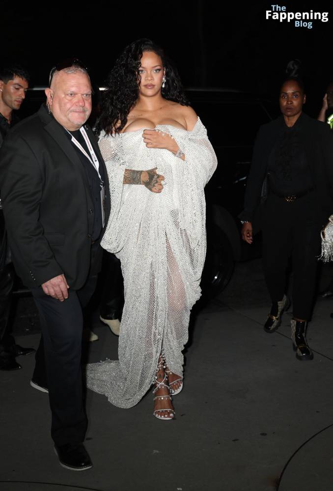 Rihanna Displays Her Curves in a White Dress (13 Photos) - #6