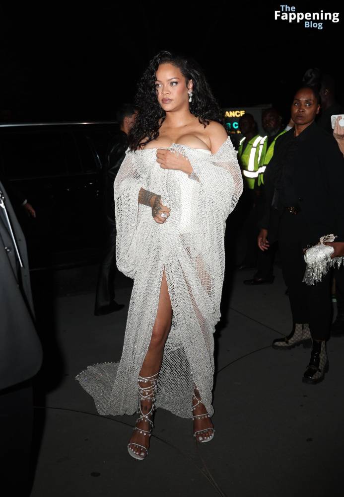 Rihanna Displays Her Curves in a White Dress (13 Photos) - #9