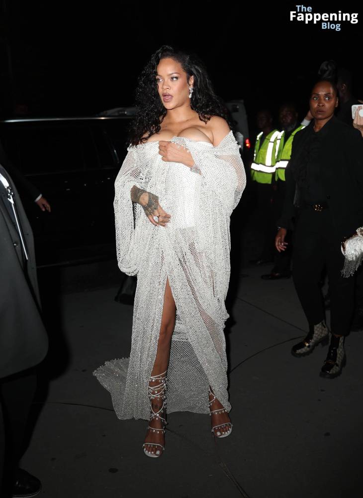 Rihanna Displays Her Curves in a White Dress (13 Photos) - #10