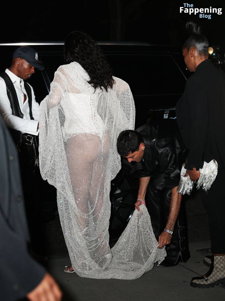 Rihanna Displays Her Curves in a White Dress (13 Photos) - #2