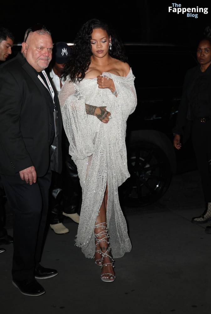 Rihanna Displays Her Curves in a White Dress (13 Photos) - #5