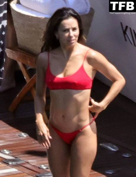Eva Longoria Showcases Her Stunning Figure and Ass Crack in a Red Bikini on Holiday in Capri on fansphoto.pics