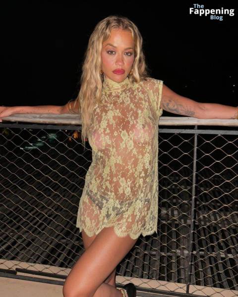 Rita Ora Shows Off Her Nude Boobs While Posing in a Sheer Dress (2 Photos) on fansphoto.pics